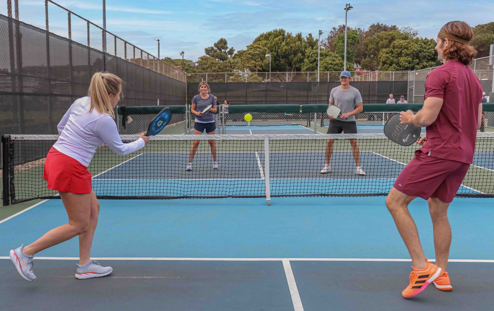 An image of people playing pickleball.