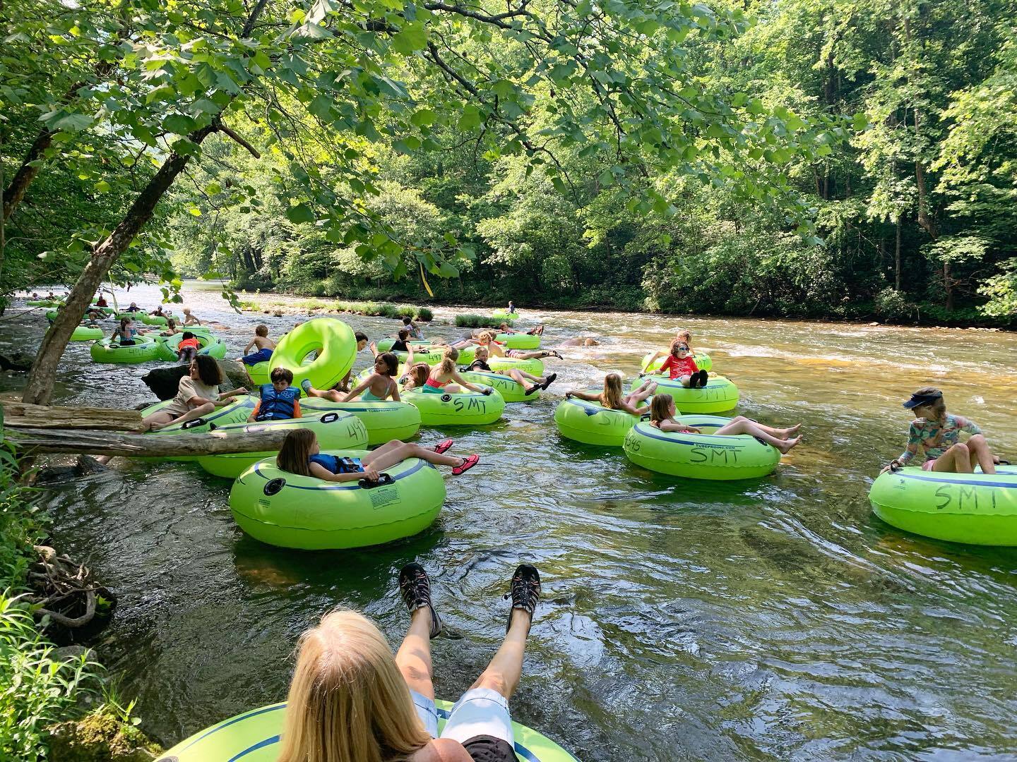 An image of people tubing down the Shiawassee River.